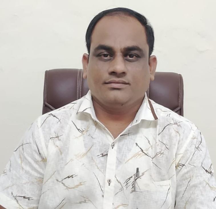 Dr. Anil G. Dodewar